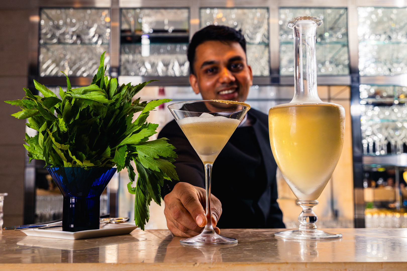 Award-winning mocktail mixologist Robi Ratan presenting a signature no-alcohol drink at IDAM by Alain Ducasse in Doha