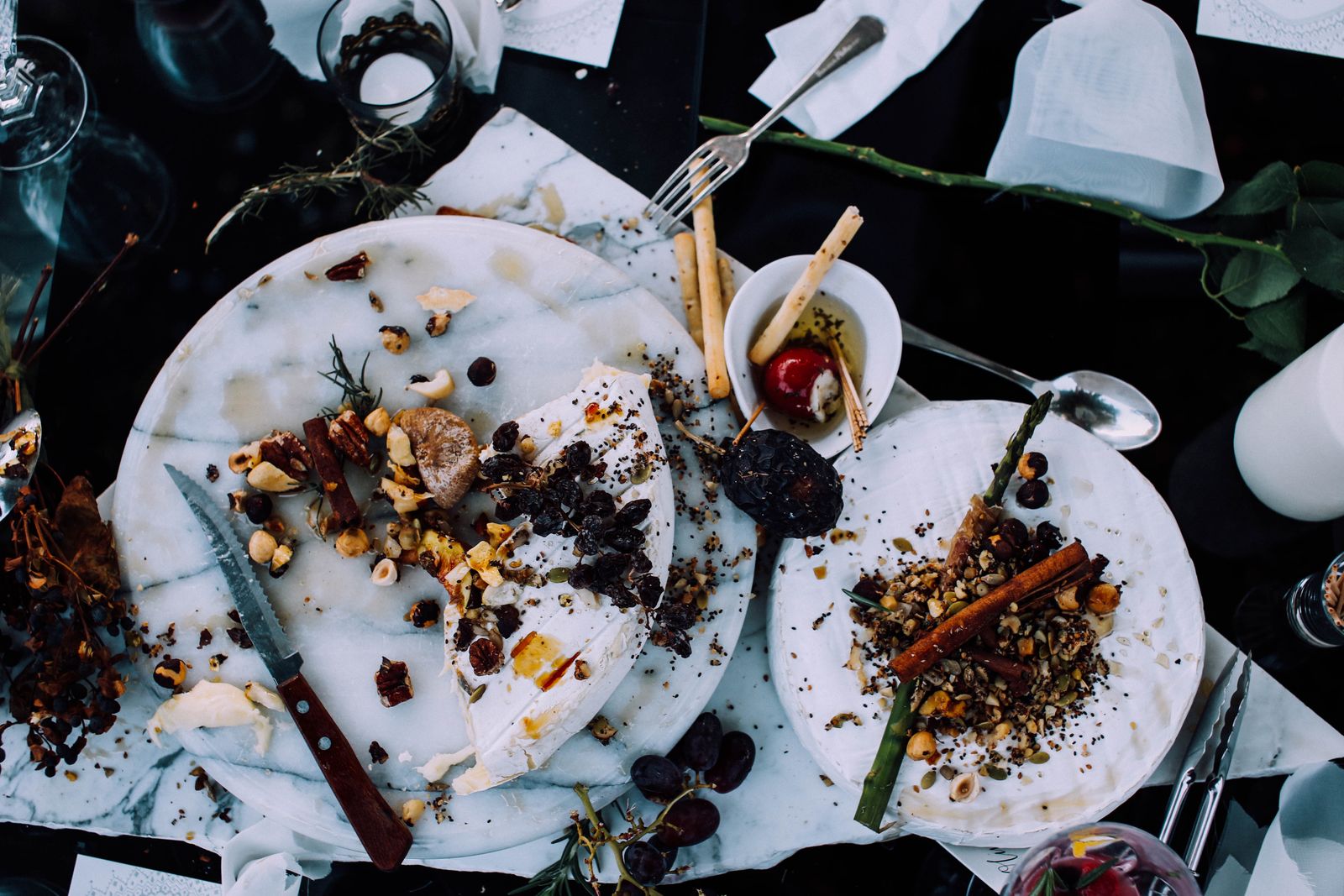 Overhead view of plates with leftover food after a meal